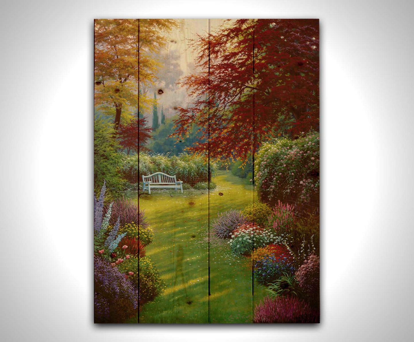 A painting of a garden of flowers in all colors. Central is a verdant path leading to a bench, surrounded by little birds searching for food. Printed on a wood pallet.