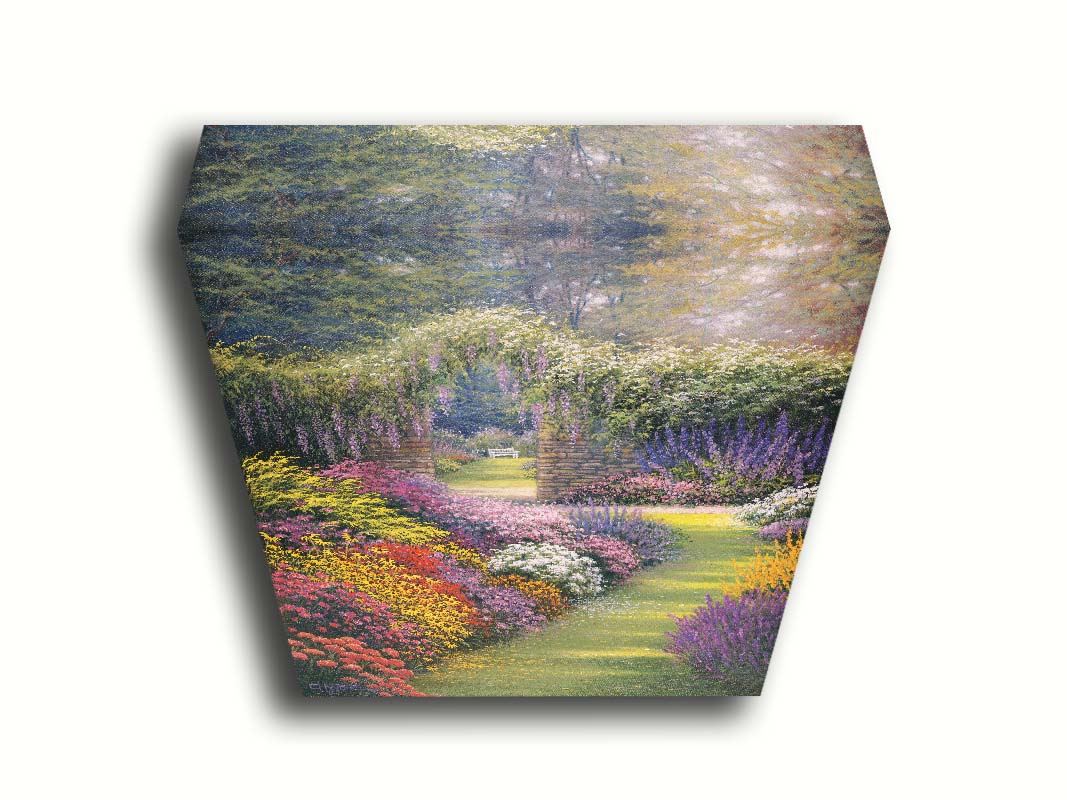 A painting of a garden path surrounded by flower bushes. The amalgam of colors leads to an archway in a stone wall, revealing a second garden area. Printed on canvas.