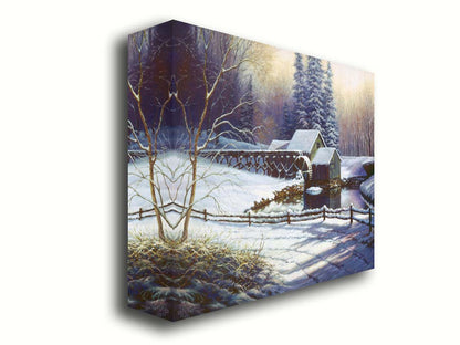 A painting of a snowy landscape centered around an old watermill, built between a country road and a forest. Printed on canvas.