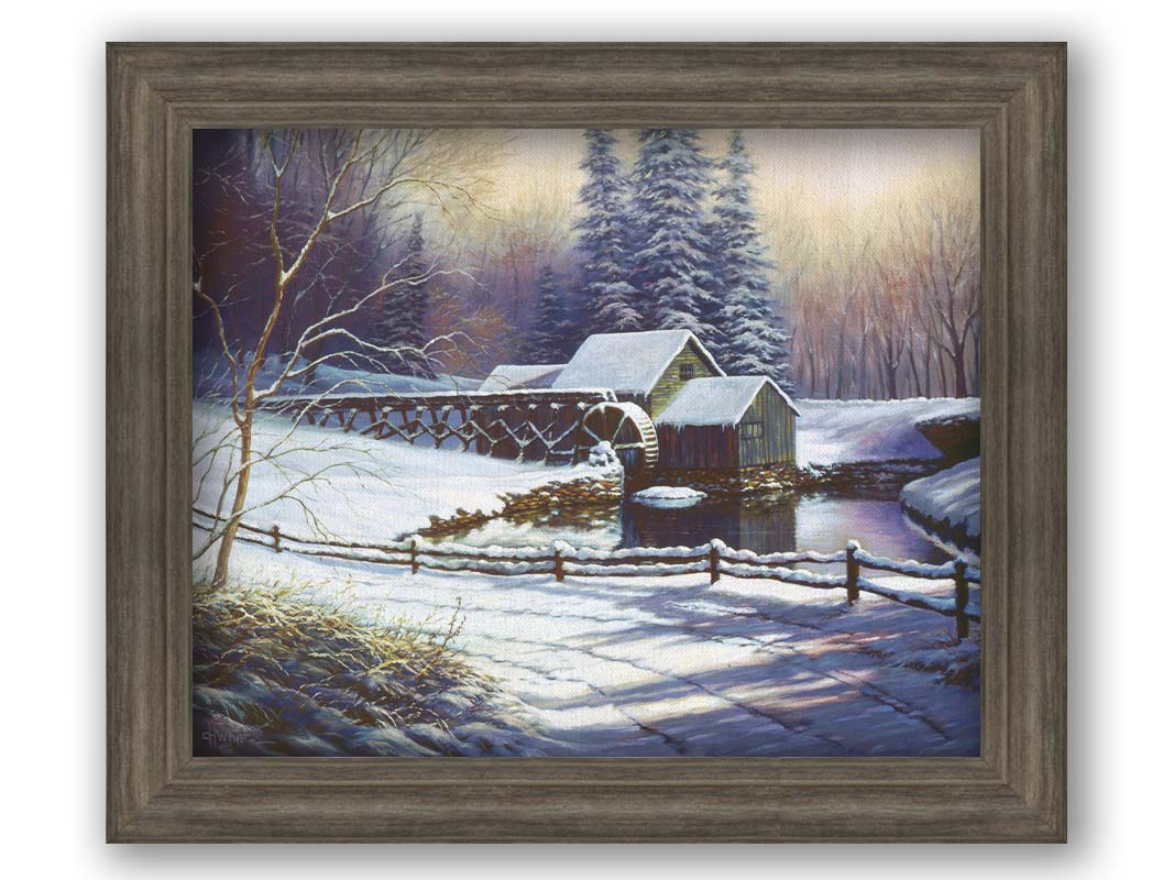 A painting of a snowy landscape centered around an old watermill, built between a country road and a forest. Prrinted on canvas and framed.