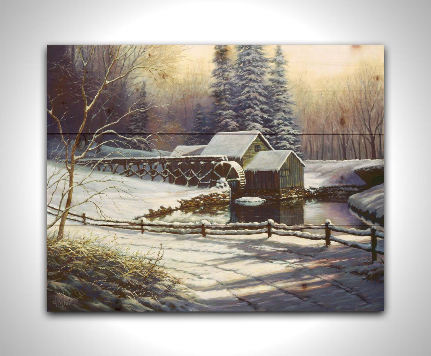 A painting of a snowy landscape centered around an old watermill, built between a country road and a forest. Printed on a wood pallet.