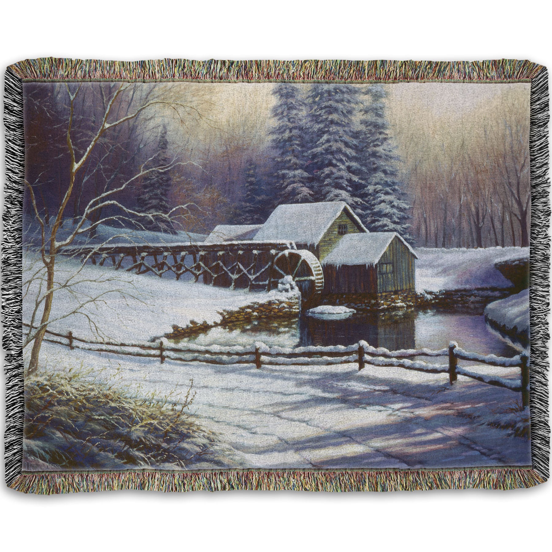 Woven throw blanket with a winter landscape design featuring a cabin and snowy trees.
