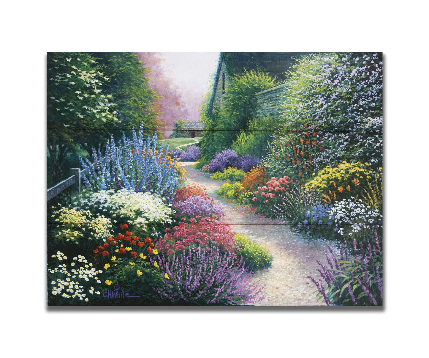 A painting of a gravel path through a garden with dense, colorful growths of flowers. The path and garden borders lead to cozy cottages. Printed on a box board.