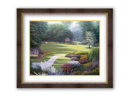 A painting of a sunny park. The open space of the grassy lawn is bordered by an abundance of colorful flowers and surrounding by trees. Printed on paper, matted, and framed.