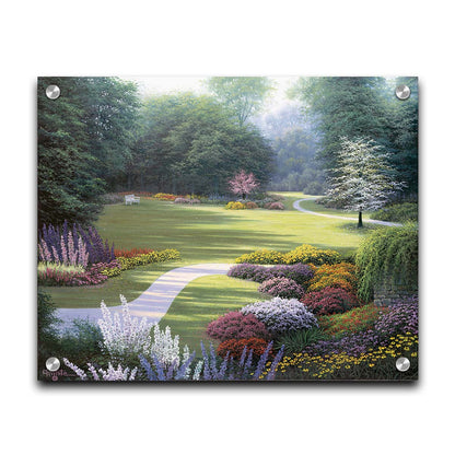 A painting of a sunny park. The open space of the grassy lawn is bordered by an abundance of colorful flowers and surrounding by trees. Printed on acrylic.