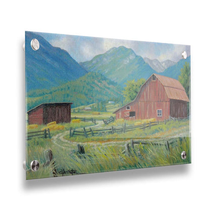 A painting of a red barn and shed surrounded by green pastures. Forested mountains stand tall in the background. Printed on acrylic.