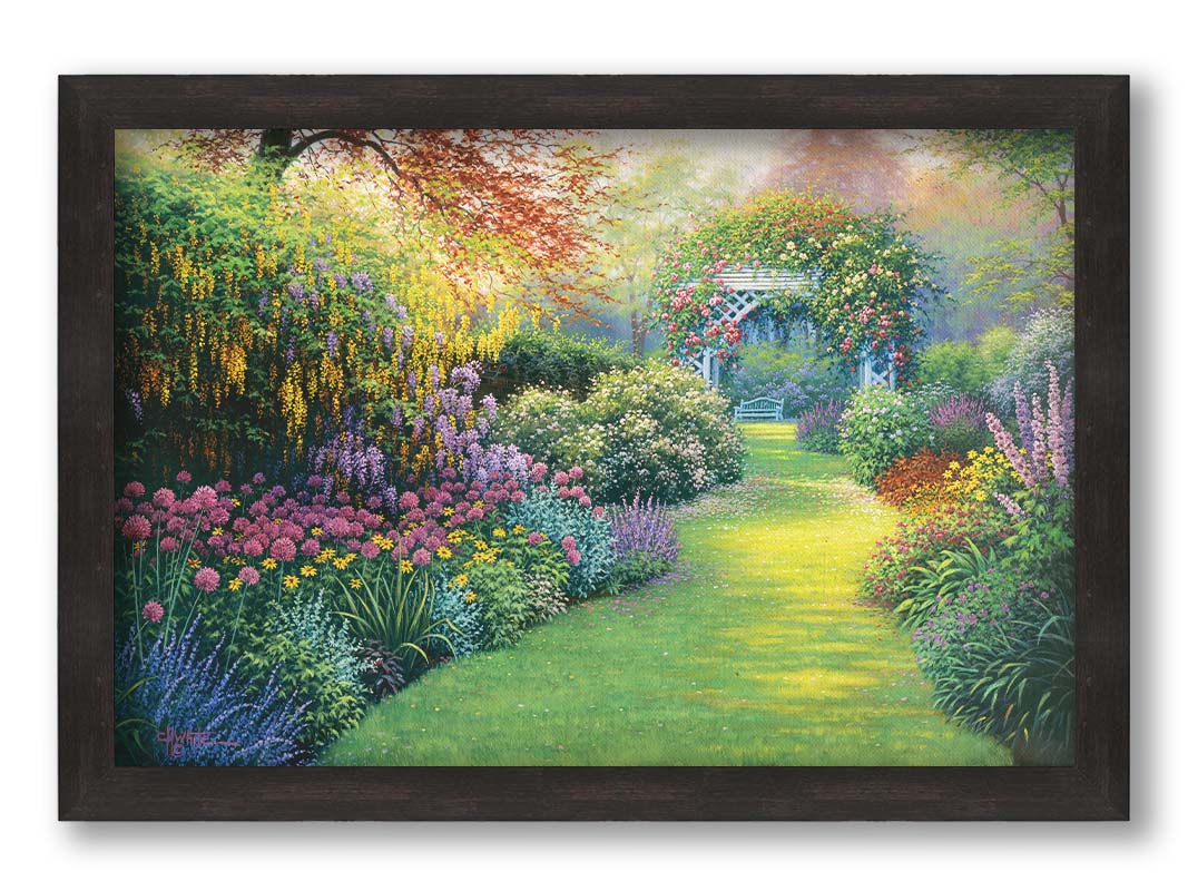 A painting of a flourishing garden with a variety of flowering plants, bordering a grass path that leads to a stunning gazebo covered in fragrant rose plants. Printed on canvas and framed.