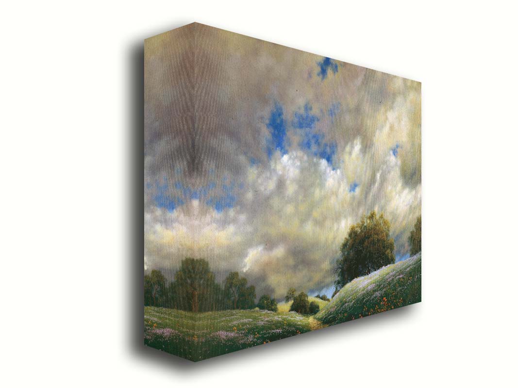 A painting of the sky over gentle hills covered in flowery meadows. Huge clouds fill the sky over the scene. Printed on canvas.