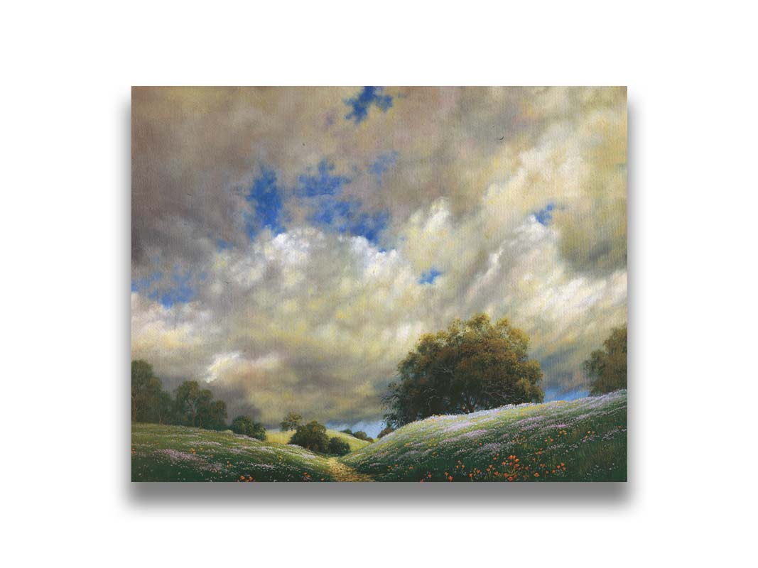 A painting of the sky over gentle hills covered in flowery meadows. Huge clouds fill the sky over the scene. Printed on canvas.