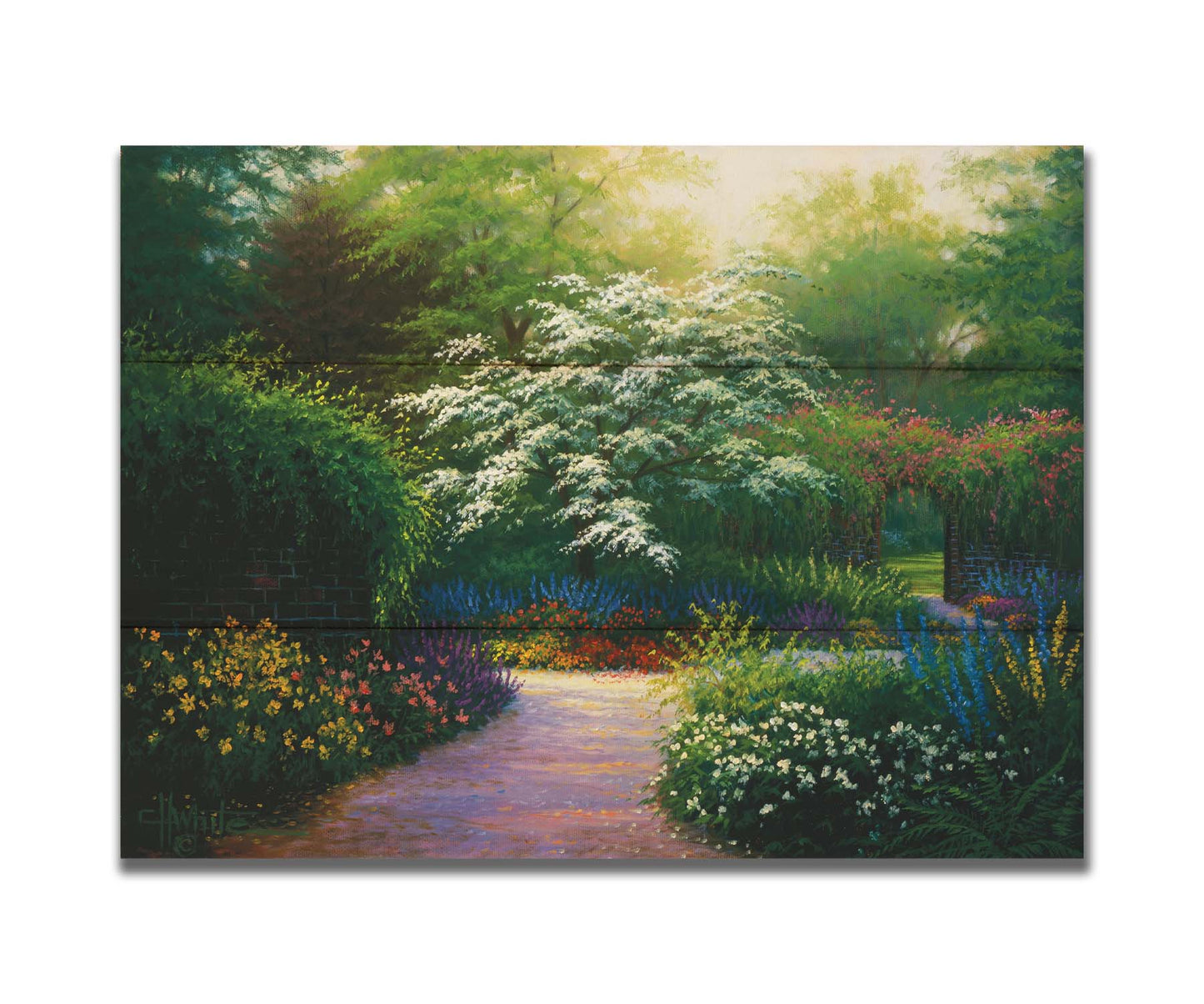 A painting of a brick wall surrounding a flower garden in a full spectrum of colors. A tree blossoming white stands central in contrast to the colorful scene. Printed on a box board.