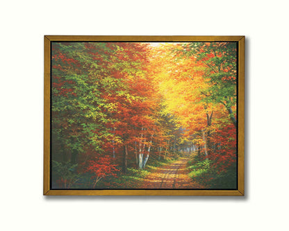 A painting of a leaf-strewn road through a forest, with light filtering through the branches to highlight the golden hues of fall. Printed on canvas in a float frame.