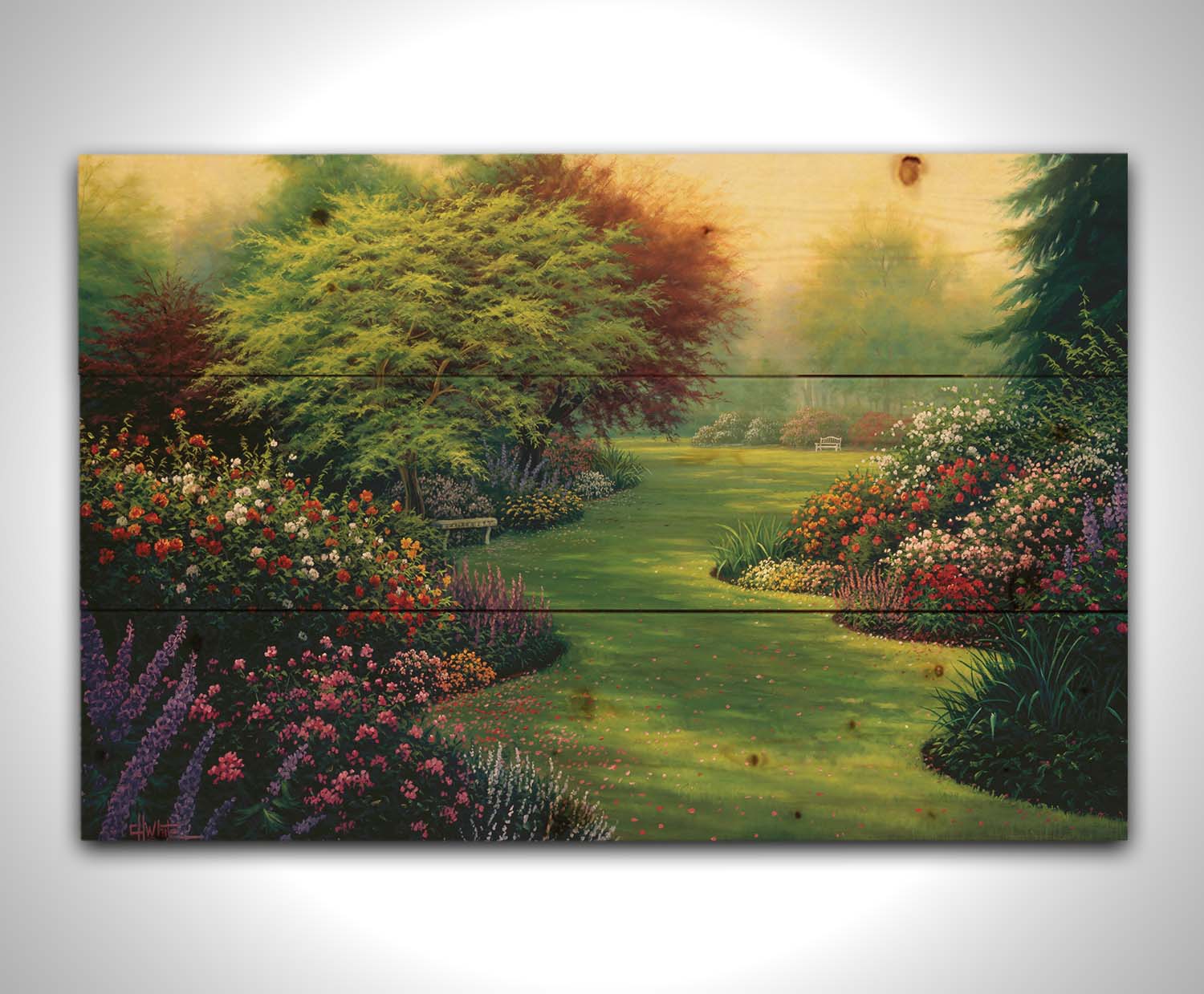 A painting of abundant flower gardens in all colors, with a lawn in between. Benches sit on the lawn, beneath blossoming trees. Printed on a wood pallet.