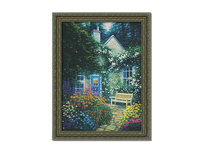 A painting of a cottage and stone path with a bench, all surrounded by colorful flower bushes and vines. Printed on canvas and framed.