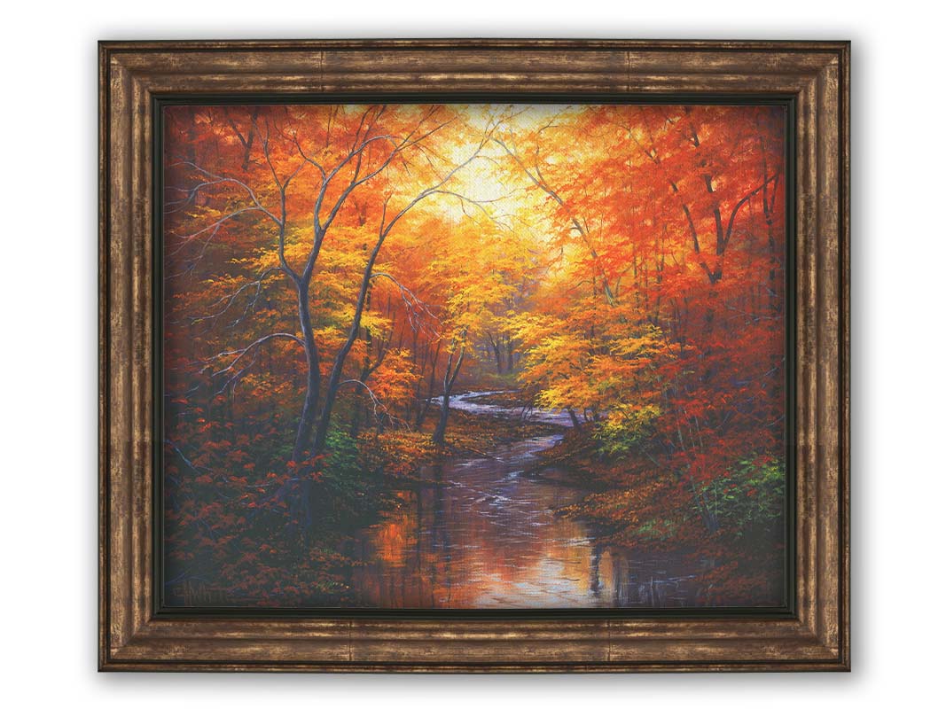 A painting of a stream through a forest in autumn. Warm hues dominate the scene, with red, orange, and yellow leaves and deep brown grasses and wood. Printed on canvas and framed.