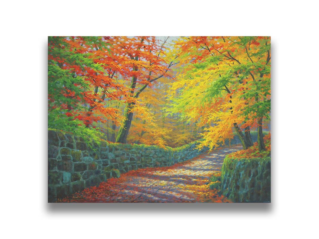 A painting of a stone road through a forest. It is bordered by stone walls on either side. The leaves of the trees are changing colors and dropping to the ground for fall. Printed on canvas.