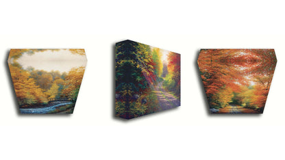 A collection of landscape paintings depicting autumn scenery. Forests of orange, yellow, red, and green trees line roads and rivers beneath white skies. Light trickles down through the leaves in a beautiful dreamlike appearance. Printed on canvas.