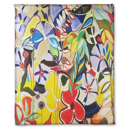 Coral fleece throw blanket designed with an abstract painting of a variety of flowers and leaves in vibrant, flat colors.