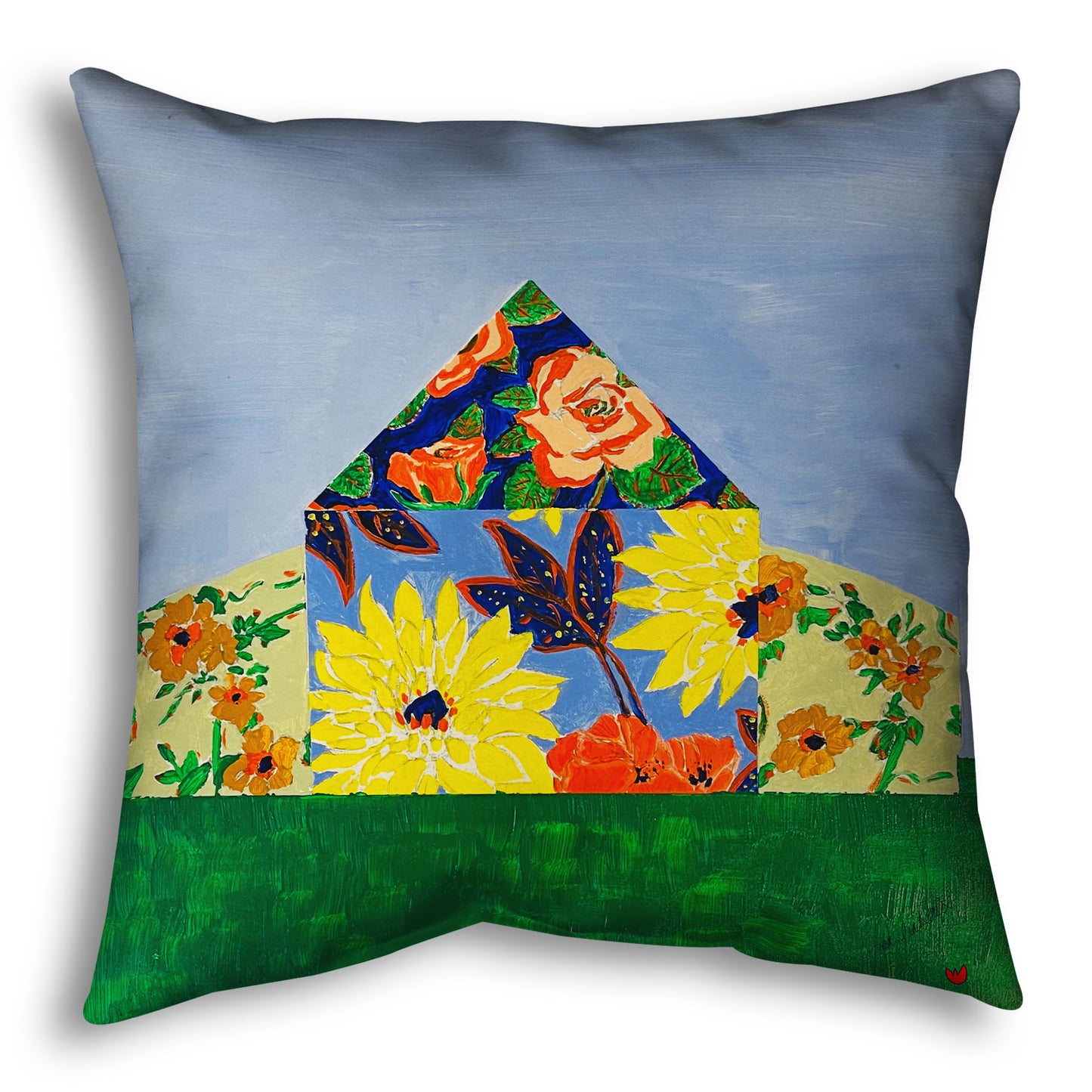 A throw pillow designed with an abstract painting of a barn silhouette formed of flower patterns, sitting on a green ground plane against a pale blue sky.