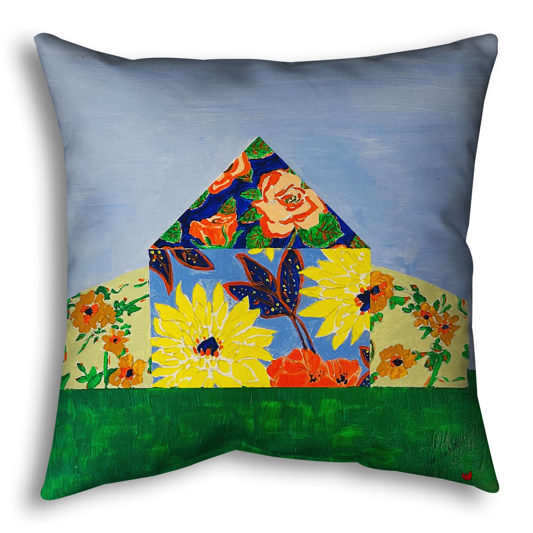 A throw pillow designed with an abstract painting of a barn silhouette formed of flower patterns, sitting on a green ground plane against a pale blue sky.