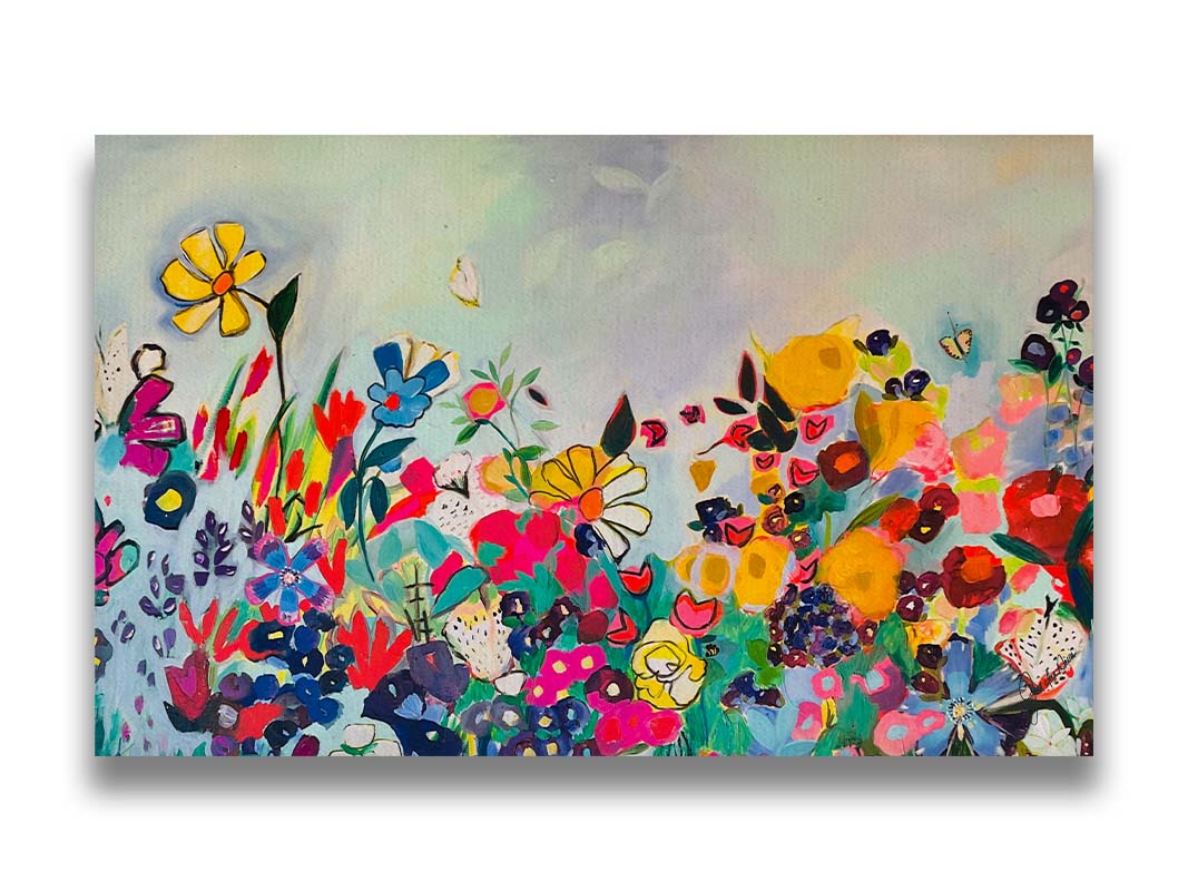 Painting of a garden of colorful flowers, with a few small butterflies flying about. Printed on canvas.