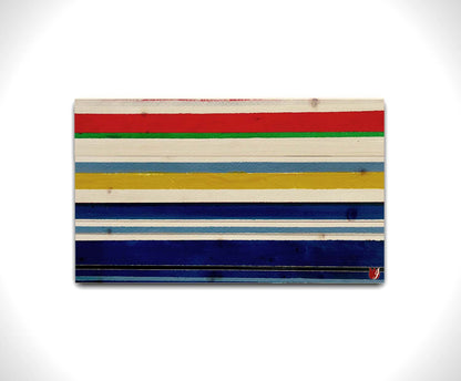 A painting of white, blue, red, yellow, and green stripes that envoke a nautical feeling. Printed on a wood pallet.