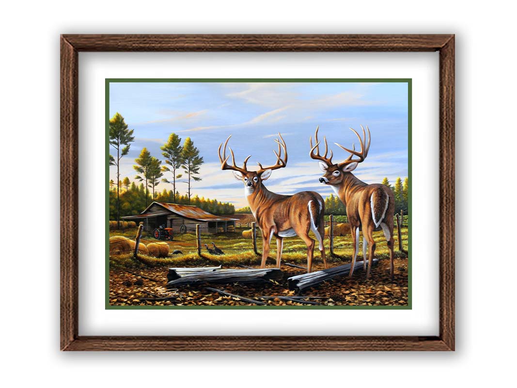 A painting of a farm landscape, featuring two deer in the foreground. Fields, buildings, hay bales, and farming equipment can be seen beyond the fence, and fallen leaves cover the ground. Printed on paper, matted, and framed.