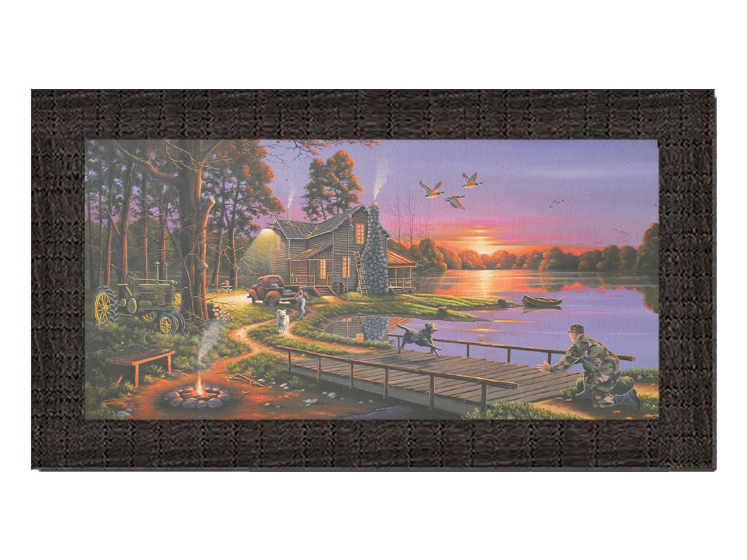 A painting of a soldier returning home to his house on the lake, being greeted by his family and dogs. Geese fly overhead into the sunset. Printed on canvas and framed.