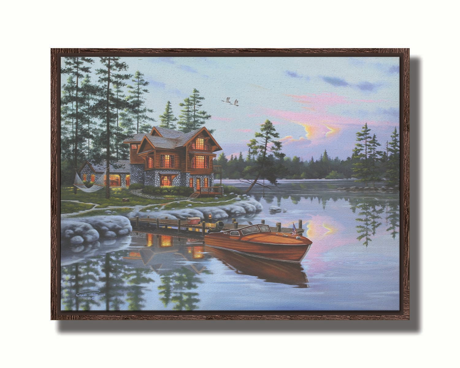 A painting of a lakeside cabin, with a boat out on the water and geese overhead. Printed on canvas in a float frame.