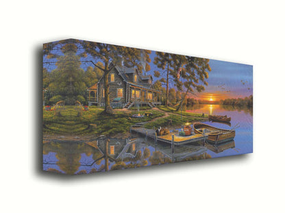 A painting of an American lakeside cabin at sunset, with boats on the water and geese overhead. Printed on canvas.