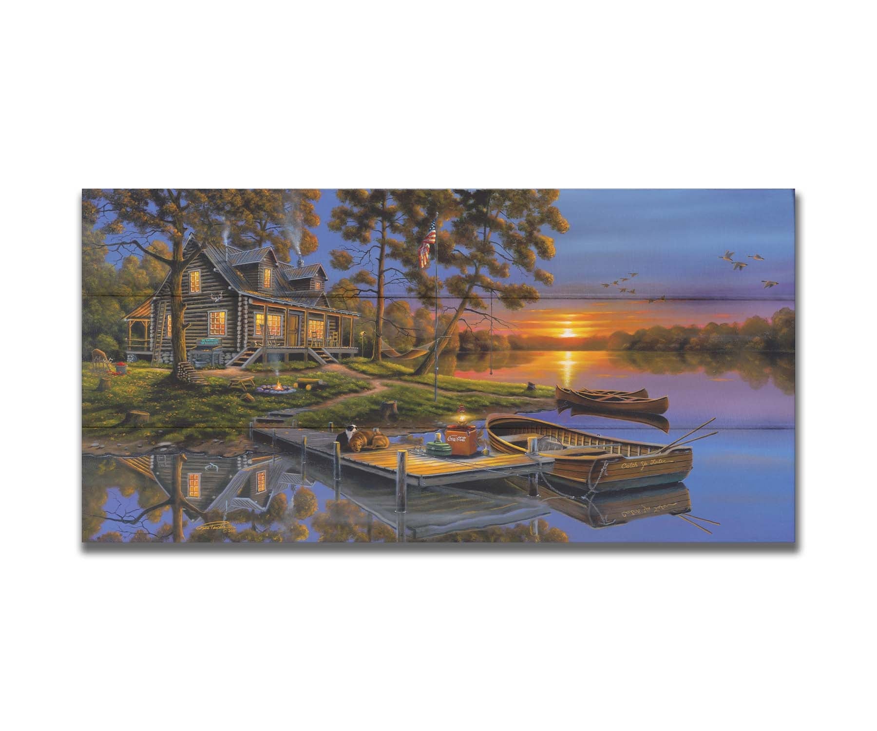 A painting of an American lakeside cabin at sunset, with boats on the water and geese overhead. Printed on a box board.