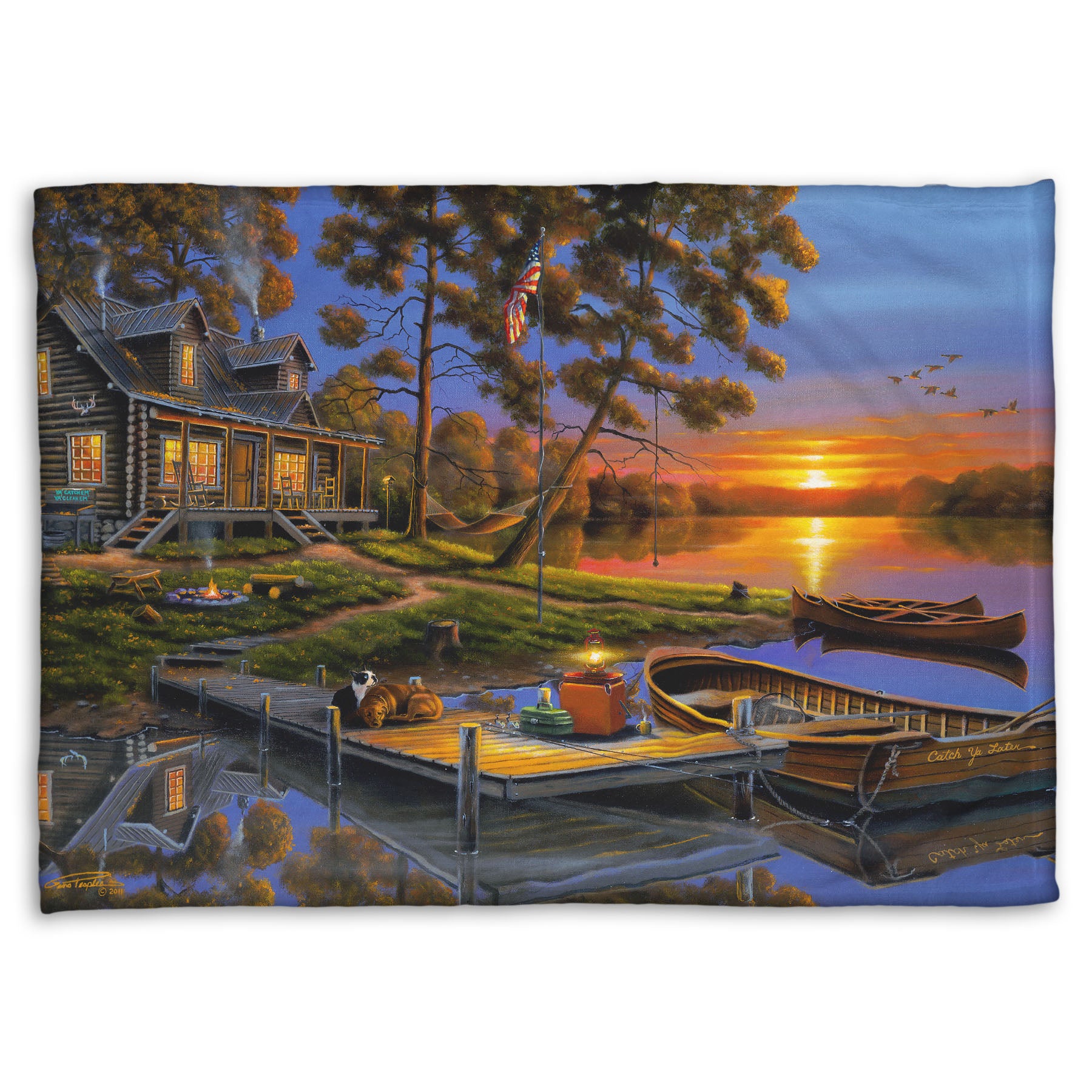 A fleece blanket designed with a painting of an American lakeside cabin at sunset, with boats on the water and geese overhead.