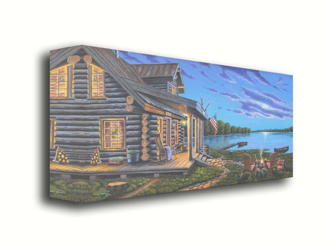 A painting of a lakeside cabin at moonrise. A stone path leads from the porch to a small campfire, as well as down to a dock where canoes rest on the water. Printed on canvas.