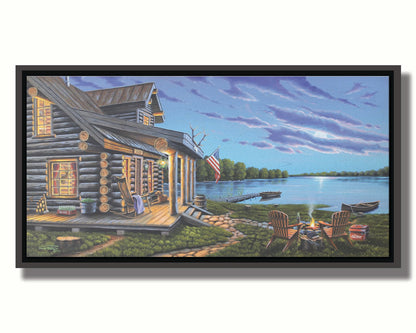 A painting of a lakeside cabin at moonrise. A stone path leads from the porch to a small campfire, as well as down to a dock where canoes rest on the water. Printed on canvas in a float frame.