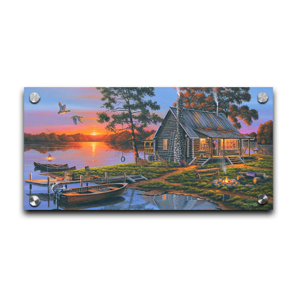 A painting of a lakeside cabin in a deciduous forest of the United States. The sunset is reflected by the water, where several small boats are docked. A lit campfire, deer, geese, and dog bring extra life to the scene. Printed on acrylic.