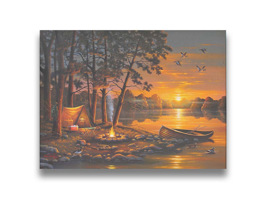 A painting of a small woods campsite at the edge of a lake. A boat is docked on the rocks of the shore, and a campfire is lit nearby. Some ducks swim in the lake as others fly overhead before the setting sun. Printed on canvas.