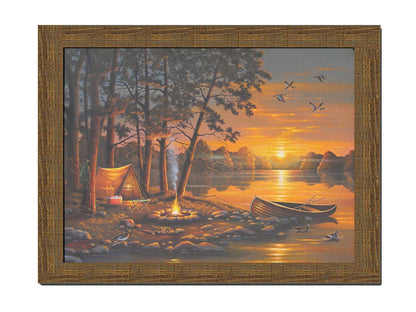 A painting of a small woods campsite at the edge of a lake. A boat is docked on the rocks of the shore, and a campfire is lit nearby. Some ducks swim in the lake as others fly overhead before the setting sun. Printed on canvas and framed.