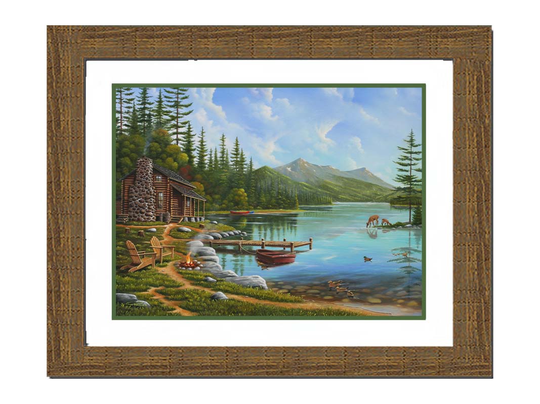 A painting of a lakeside cabin on a sunny day. Boats can be seen on the water, which reflects the mountains in the distance. Deer drink from the lake, where ducks are swimming. Wood chairs surround a small campfire on the shore nearby. Printed on paper, matted, and framed.