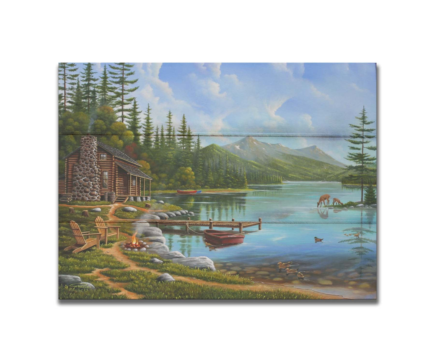 A painting of a lakeside cabin on a sunny day. Boats can be seen on the water, which reflects the mountains in the distance. Deer drink from the lake, where ducks are swimming. Wood chairs surround a small campfire on the shore nearby. Printed on a box board.