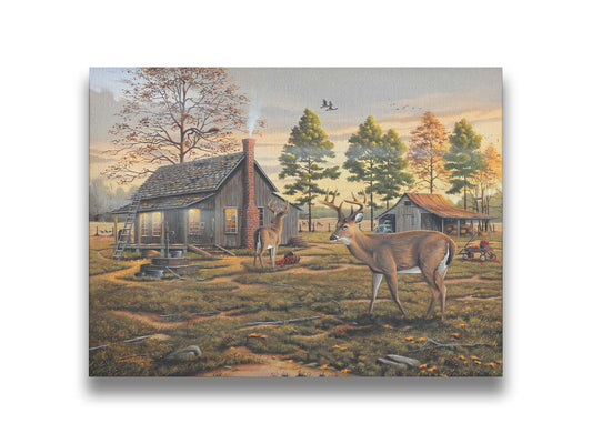 A painting of a farmhouse scene, featuring a fenced field, wood cabin, and an accompanying shed. In the foreground, deer are eating apples from wagons and baskets in the yard. Printed on canvas.