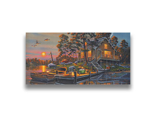 A painting of a lakeside cabin with a nearby dock. A fishing boat is tied up, and supplies are nearby to go fishing. The sunset is reflecting off the water. Printed on canvas.