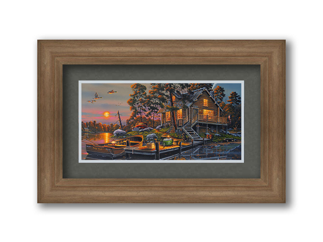 A painting of a lakeside cabin with a nearby dock. A fishing boat is tied up, and supplies are nearby to go fishing. The sunset is reflecting off the water. Printed on paper, matted, and framed.