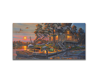 A painting of a lakeside cabin with a nearby dock. A fishing boat is tied up, and supplies are nearby to go fishing. The sunset is reflecting off the water. Printed on a box board.