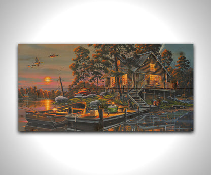 A painting of a lakeside cabin with a nearby dock. A fishing boat is tied up, and supplies are nearby to go fishing. The sunset is reflecting off the water. Printed on a wood pallet.