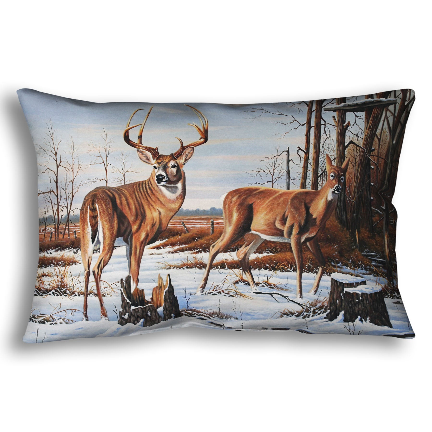 Decorative throw pillow designed with deer walking through the snow between the woods and a field.