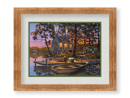 A painting of a lakeside log cabin hunting lodge at sunset. A rowboat is tied to the nearby dock, where shotguns are leaned against a cooler. Printed on paper, matted, and framed.