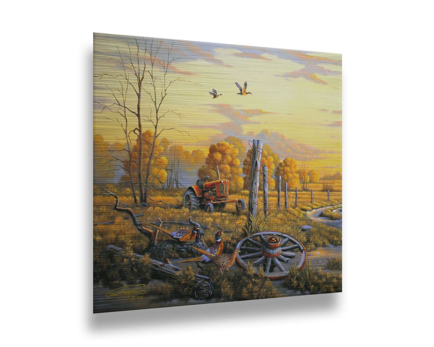 A landscape painting of autumn trees and a field. A tractor, a broken wheel, and a broken fence post add extra character to the scene. Pheasants sit in the foreground and ducks fly overhead. The sky and field are as golden yellow as the trees, in the morning light. Printed on metal.