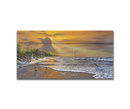 A painting of a beach scene, with a house and lighthouse in the distance. Birds trot along the sand, and the sun peeks from behind a cloud, shining beams of light down on them. Printed on a box board.