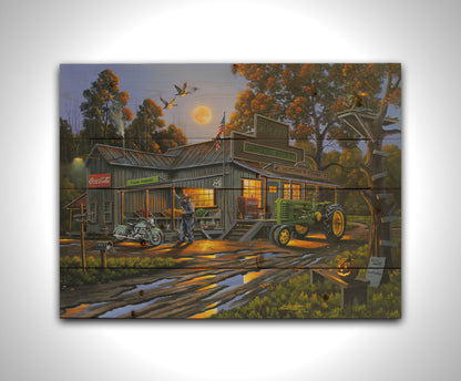 A painting of a general store nestled in the woods, offering fresh produce, hunting and fishing supplies, and Coca-Cola soda pop on a brisk October night. Printed on a wood pallet.