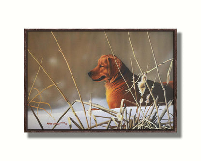 A portrait painting of a golden retriever, surrounded by a snowy landscape with brown, dead plants frozen in the winter cold. Printed on canvas in a float frame.