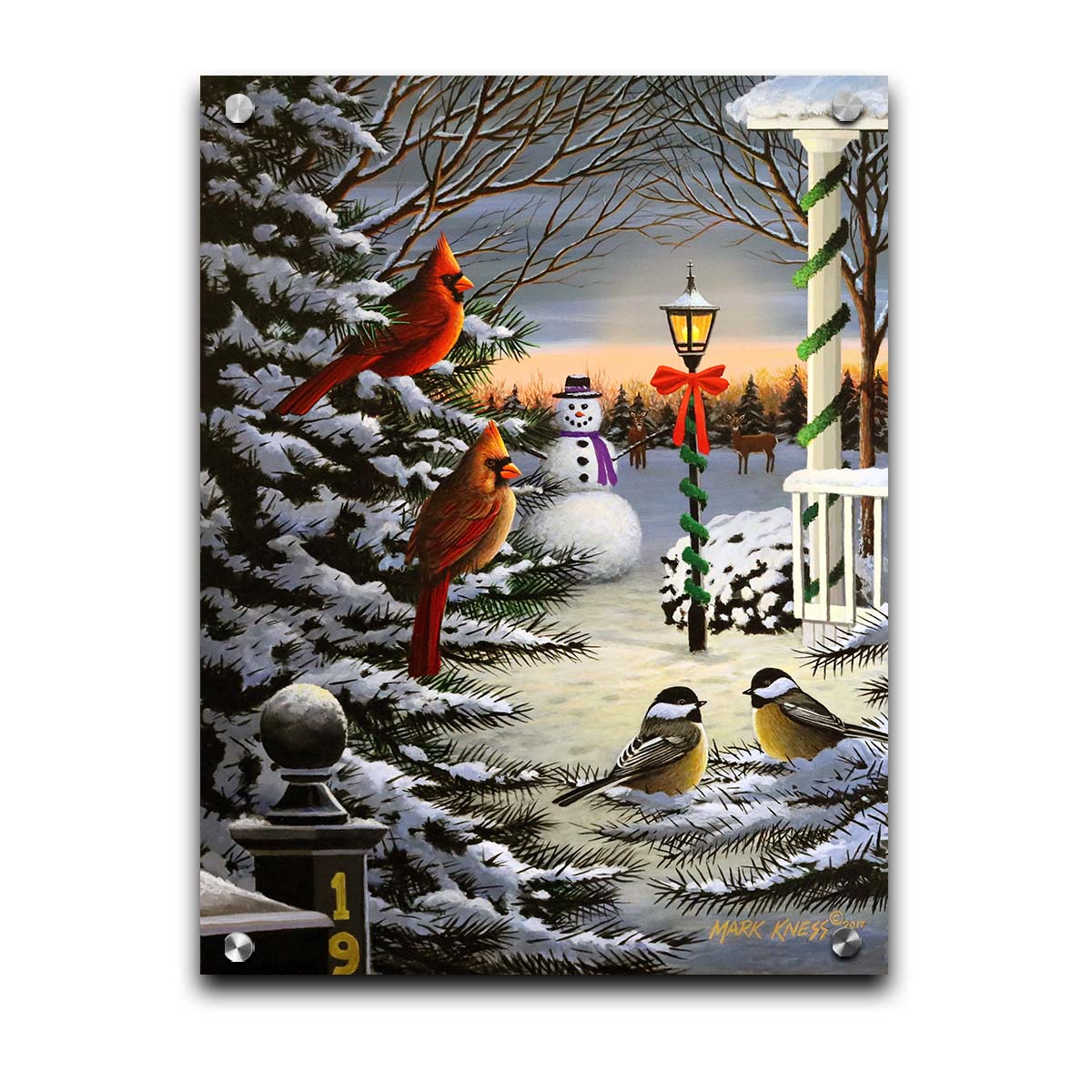 A painting of cardinals and chickadees perched on snowy evergreen branches. In the background, a festively decorated streetlamp illuminates a nearby snowman. Deer look on in the distance. Printed on acrylic.